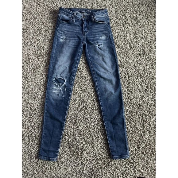 American Eagle Outfitters Denim - American Eagle  super stretch jeggings size 0 distressed Skinny Leg Medium Wash
